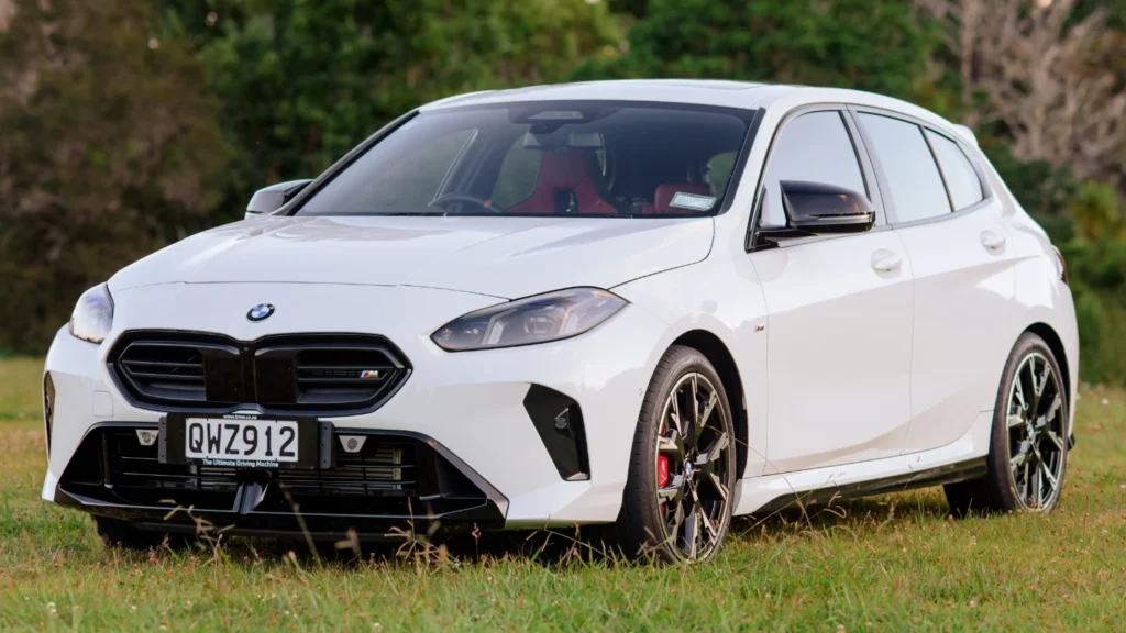 BMW M135i sport hatch viewed from the front angle highlighting wheels and M Sport styling