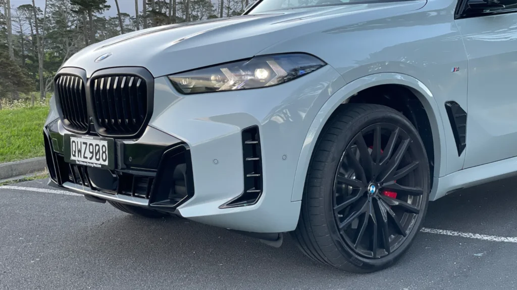 Close-up of BMW X5 M Sport front grille and bumper in black finish