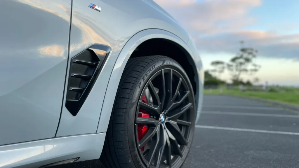 BMW X5 M Sport front wheel with black alloy rim and side air vent