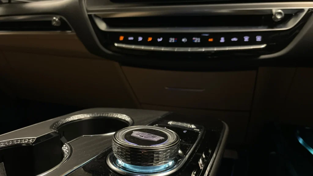 Close-up of the Cadillac Lyriq rotary gear selector and center console controls