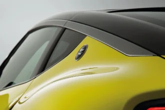 Rear quarter view of the Nissan Nismo Z showing the Z badge, roofline, and sculpted bodywork