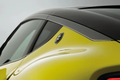 Rear quarter view of the Nissan Nismo Z showing the Z badge, roofline, and sculpted bodywork