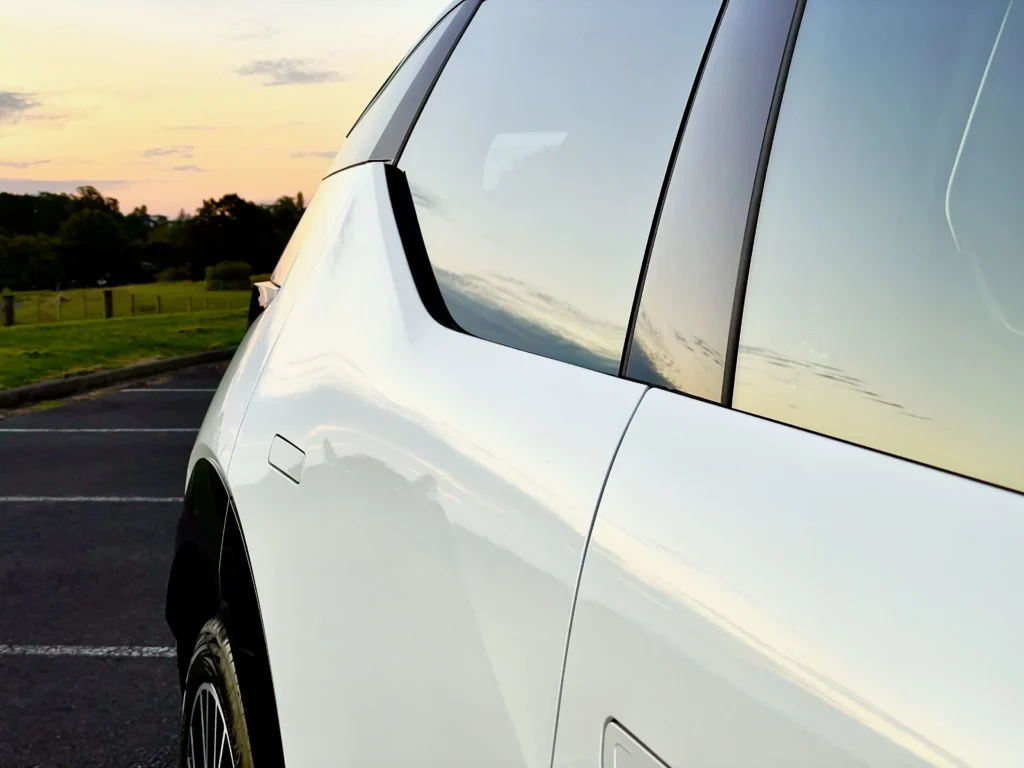 Zeekr X side body panel and flush door handle close-up exterior detail