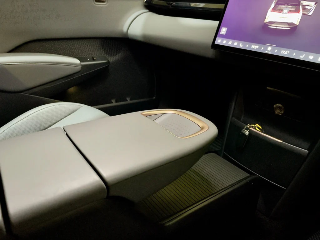 Zeekr X center console and armrest with storage and wireless charging pad